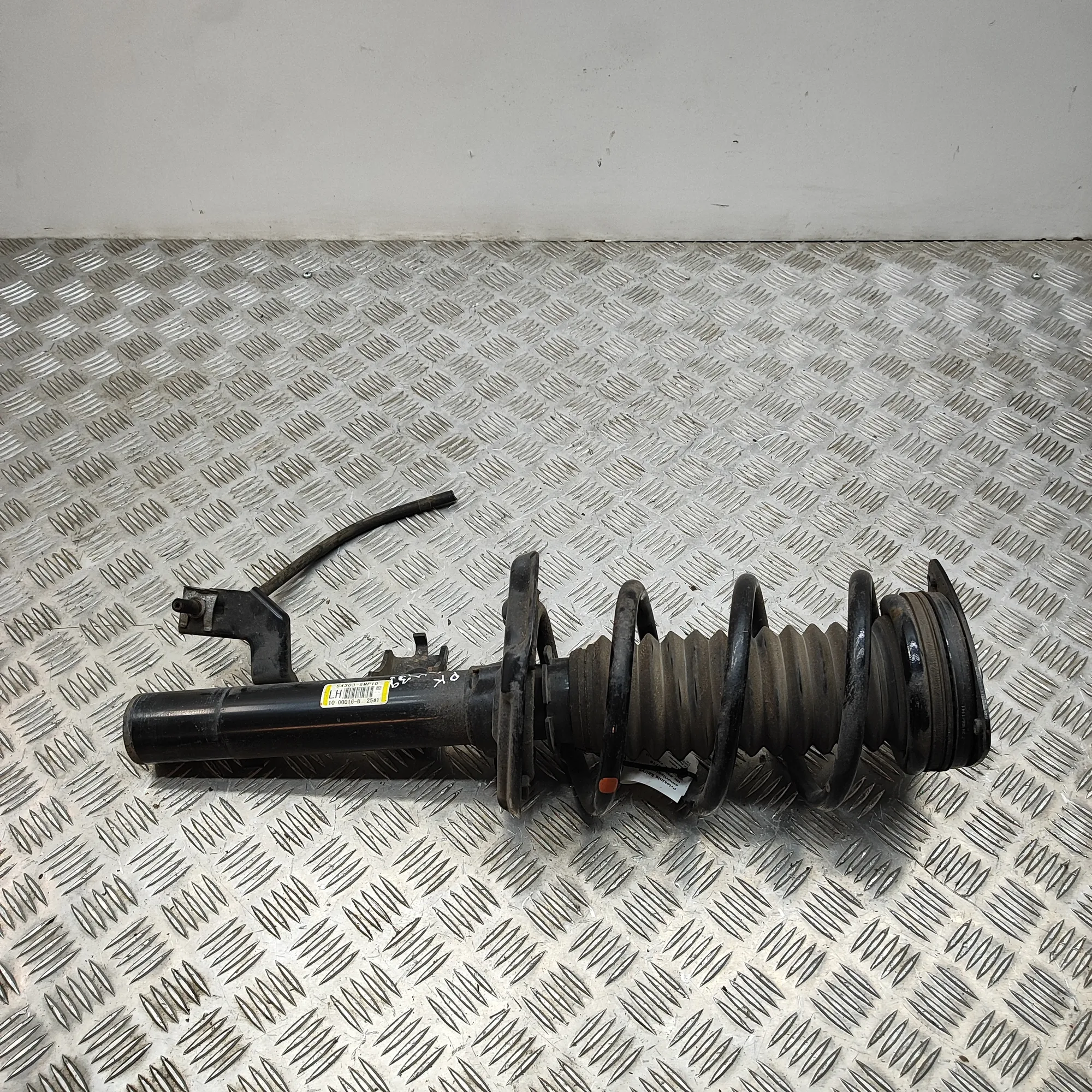 NISSAN ARIYA FE0 Front Left Shock Absorber 54303-5MP1D Electricity 178kW 2025